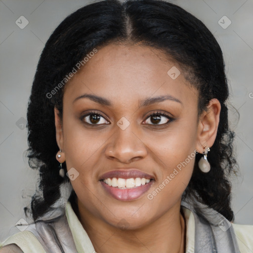 Joyful black young-adult female with long  brown hair and brown eyes