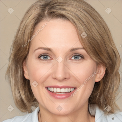 Joyful white adult female with medium  brown hair and grey eyes