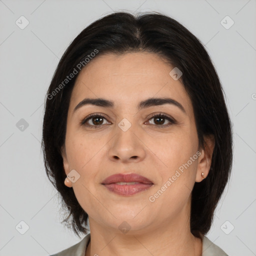 Joyful latino young-adult female with medium  brown hair and brown eyes