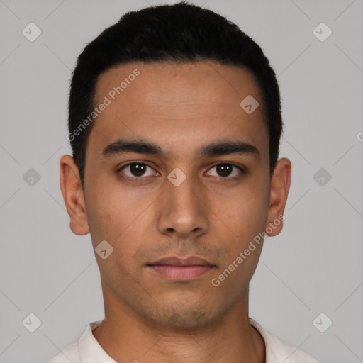 Neutral latino young-adult male with short  black hair and brown eyes