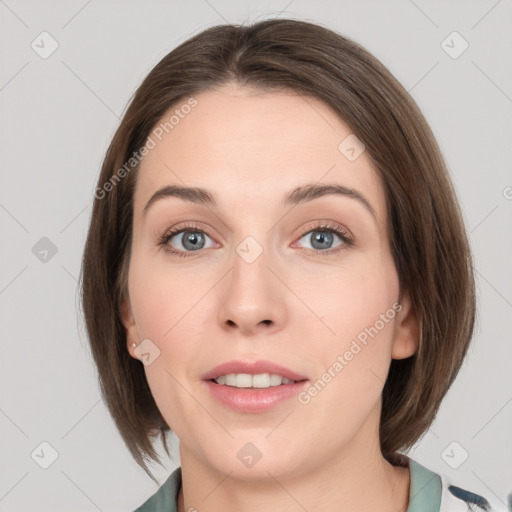 Neutral white young-adult female with medium  brown hair and grey eyes