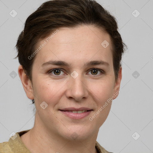 Joyful white young-adult female with short  brown hair and grey eyes