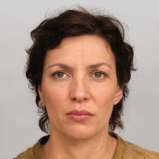 Neutral white adult female with medium  brown hair and brown eyes