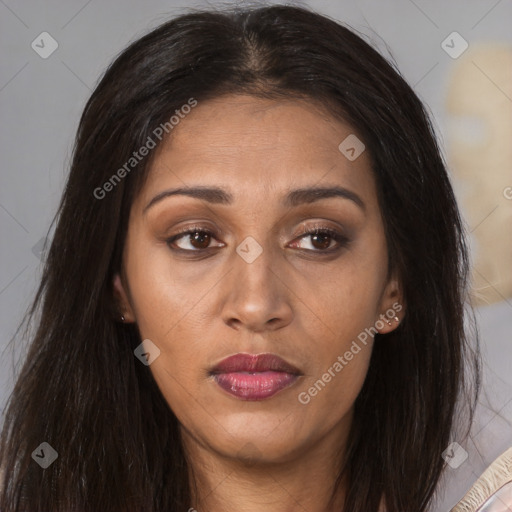 Joyful asian young-adult female with long  brown hair and brown eyes