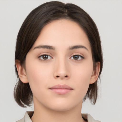 Neutral white young-adult female with medium  brown hair and brown eyes