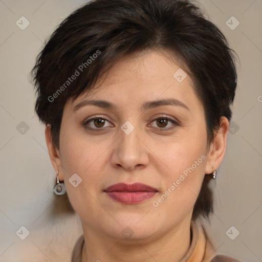 Joyful white adult female with medium  brown hair and brown eyes