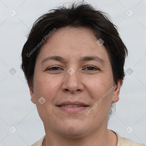 Joyful white adult female with short  brown hair and brown eyes