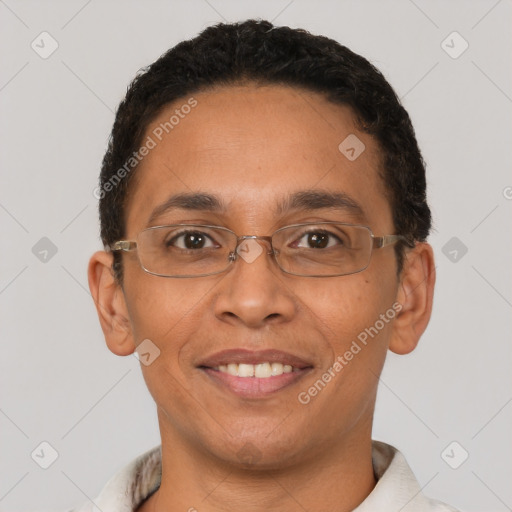 Joyful latino adult male with short  black hair and brown eyes