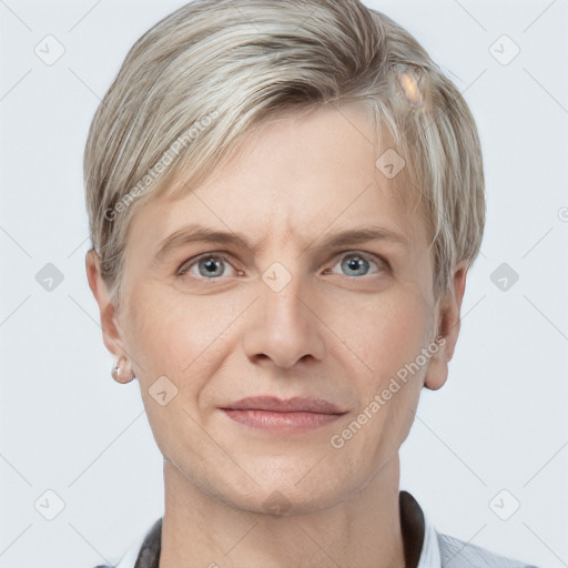 Joyful white adult male with short  brown hair and grey eyes