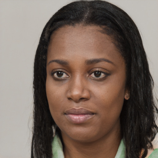 Neutral black young-adult female with long  black hair and brown eyes
