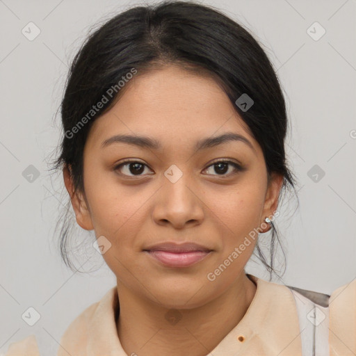 Joyful latino young-adult female with medium  brown hair and brown eyes