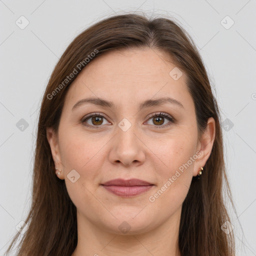 Joyful white young-adult female with long  brown hair and brown eyes