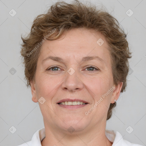 Joyful white adult female with short  brown hair and brown eyes