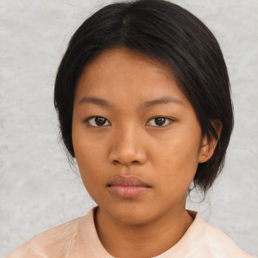 Neutral asian young-adult female with medium  black hair and brown eyes