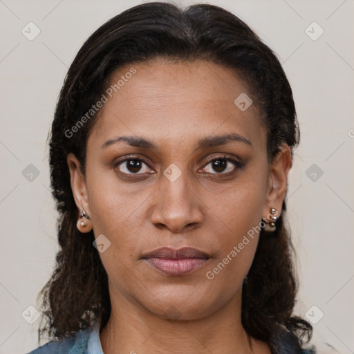 Neutral black young-adult female with medium  brown hair and brown eyes