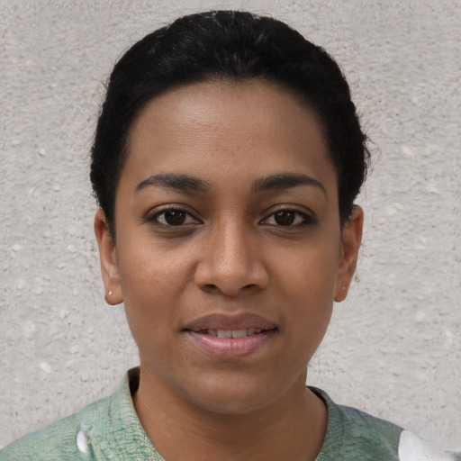 Joyful asian young-adult female with short  black hair and brown eyes