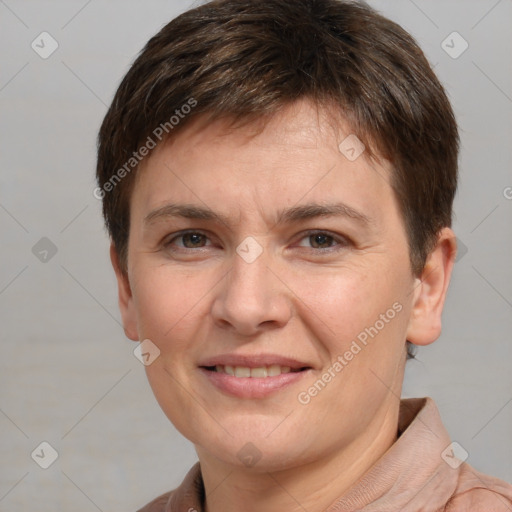 Joyful white adult female with short  brown hair and brown eyes