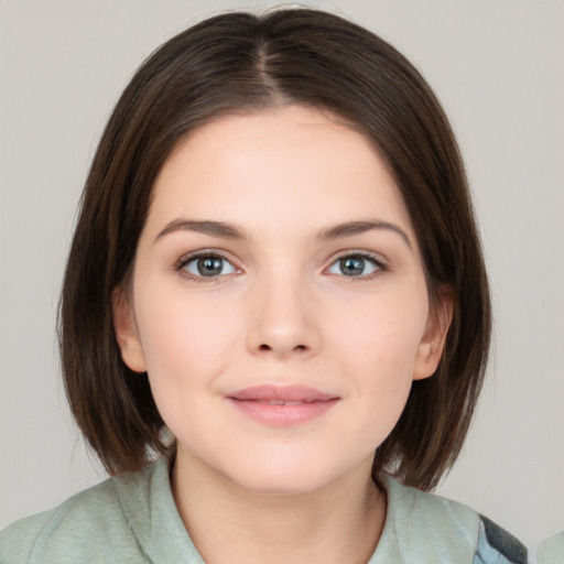 Neutral white young-adult female with medium  brown hair and brown eyes