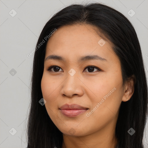 Joyful asian young-adult female with long  black hair and brown eyes