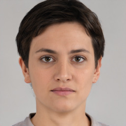 Neutral white young-adult female with short  brown hair and brown eyes