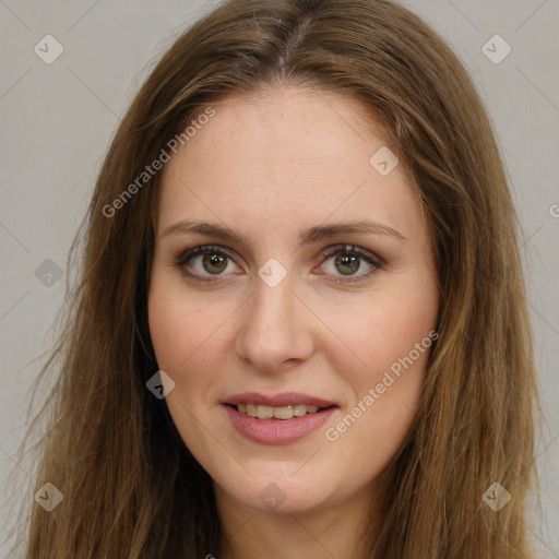 Joyful white young-adult female with long  brown hair and green eyes