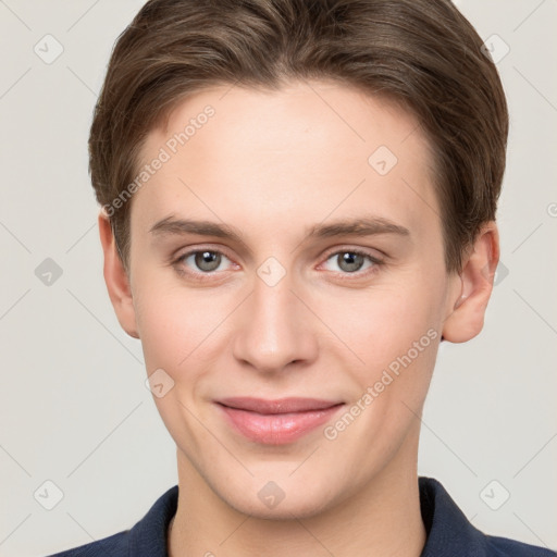 Joyful white young-adult female with short  brown hair and grey eyes