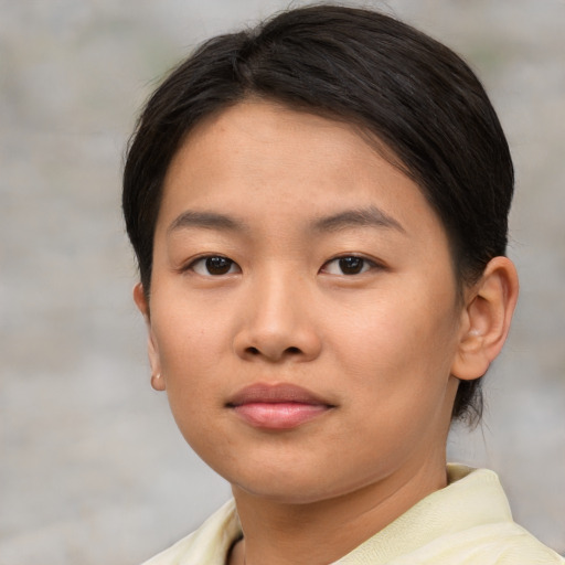Neutral asian young-adult female with short  brown hair and brown eyes