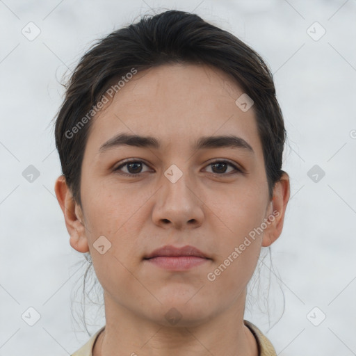 Neutral white young-adult female with short  brown hair and brown eyes