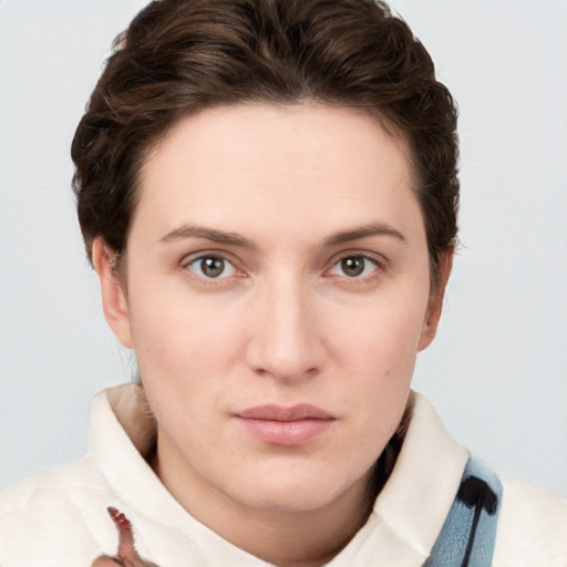 Neutral white young-adult female with short  brown hair and brown eyes