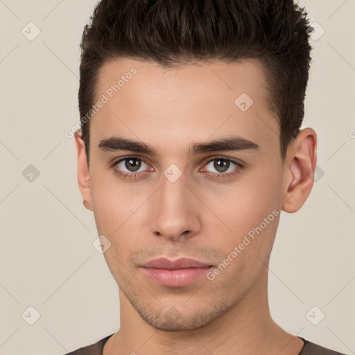 Neutral white young-adult male with short  brown hair and brown eyes