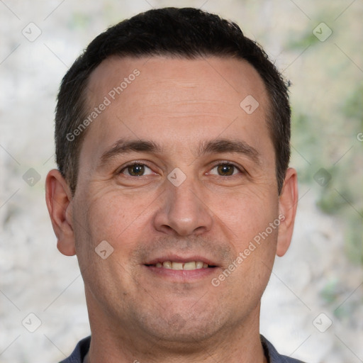 Joyful white adult male with short  brown hair and brown eyes