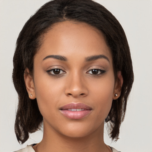 Neutral white young-adult female with medium  brown hair and brown eyes