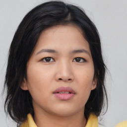 Neutral asian young-adult female with medium  brown hair and brown eyes