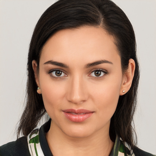 Joyful white young-adult female with medium  brown hair and brown eyes