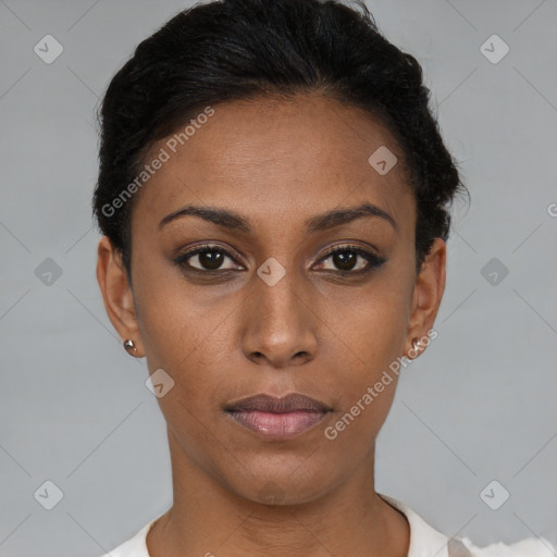 Neutral black young-adult female with short  black hair and brown eyes