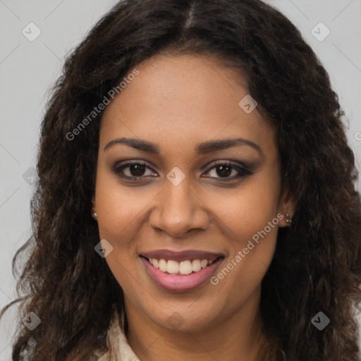 Joyful black young-adult female with long  brown hair and brown eyes