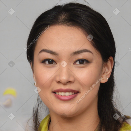 Joyful latino young-adult female with medium  brown hair and brown eyes