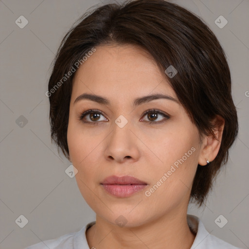 Neutral white young-adult female with medium  brown hair and brown eyes