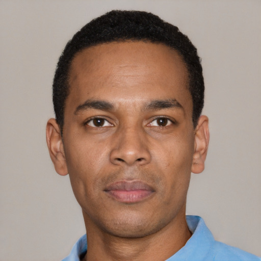 Neutral black young-adult male with short  black hair and brown eyes