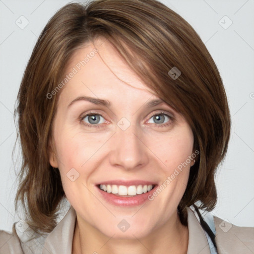 Joyful white young-adult female with medium  brown hair and blue eyes