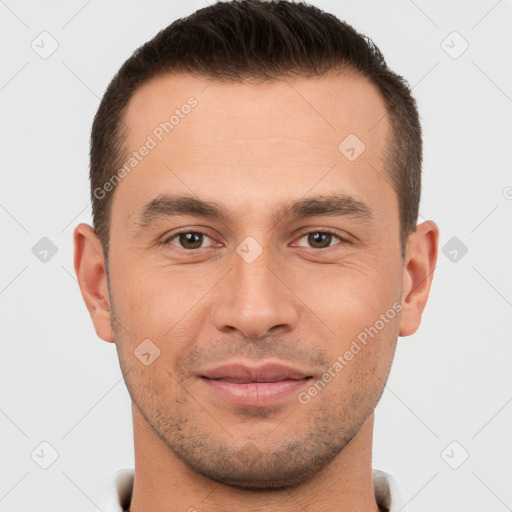 Joyful white young-adult male with short  brown hair and brown eyes