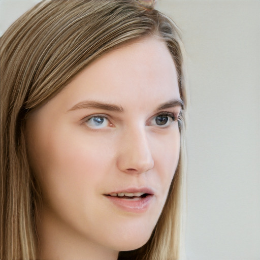 Neutral white young-adult female with long  brown hair and blue eyes