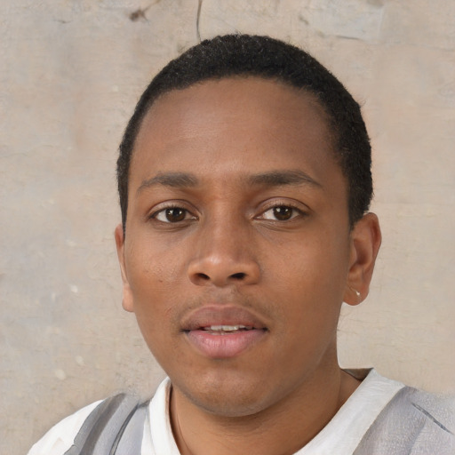 Neutral black young-adult male with short  black hair and brown eyes
