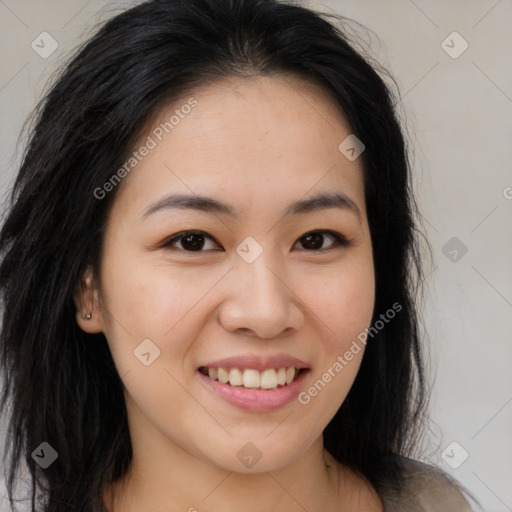 Joyful asian young-adult female with long  brown hair and brown eyes