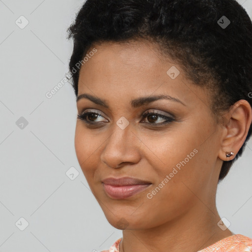 Joyful latino young-adult female with short  brown hair and brown eyes