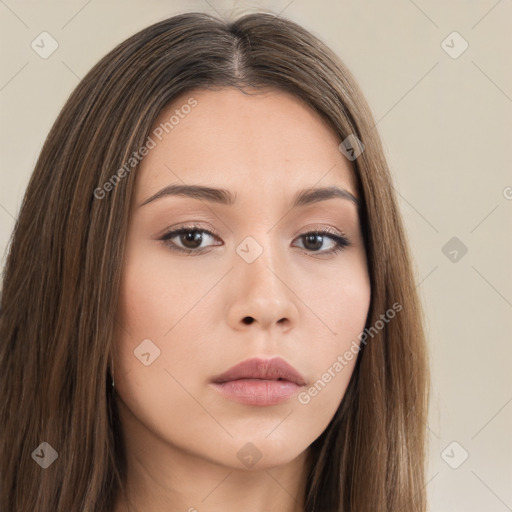 Neutral white young-adult female with long  brown hair and brown eyes