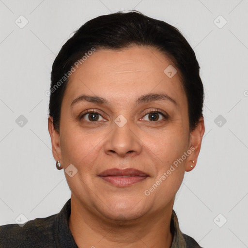 Joyful white adult female with short  brown hair and brown eyes