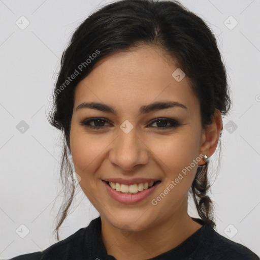 Joyful latino young-adult female with long  brown hair and brown eyes