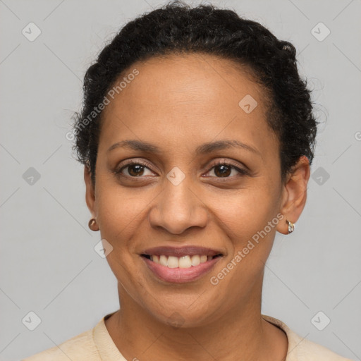 Joyful latino young-adult female with short  brown hair and brown eyes