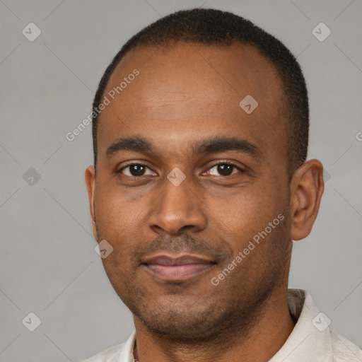 Neutral latino young-adult male with short  brown hair and brown eyes